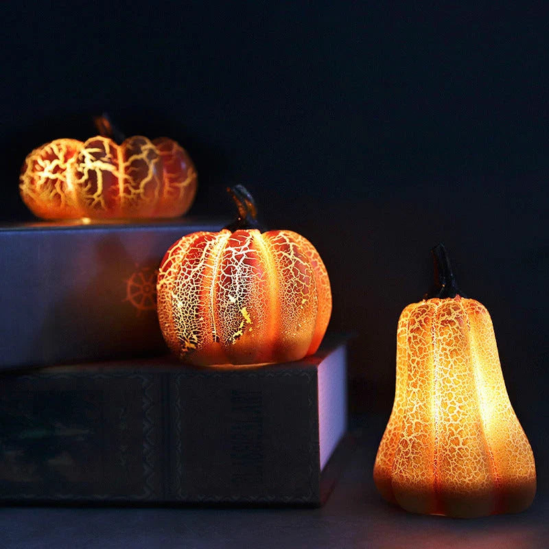 Enchanting resin pumpkin lanterns with realistic textures and LED candle illumination for Halloween decor and celebrations