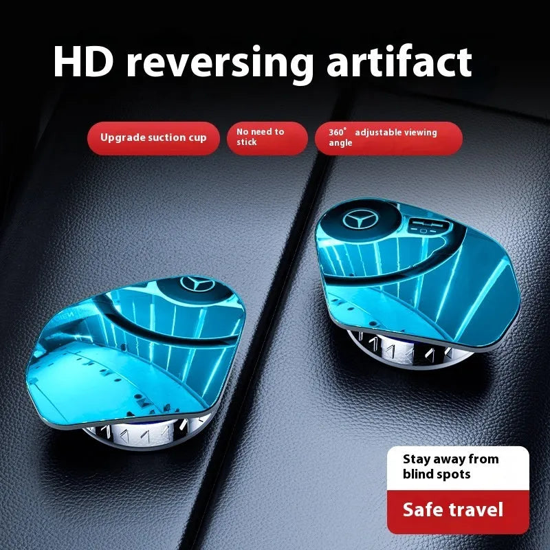 Pair of 360-degree wide-angle suction cup car mirrors in black, white, and silver on a car windscreen