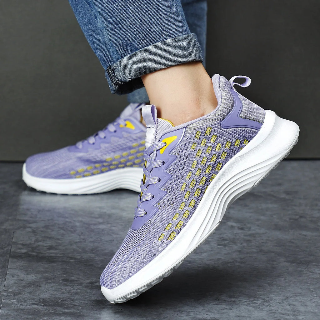 Women's lavender purple Flyknit running shoes with mesh lining and striped pattern, flat heel