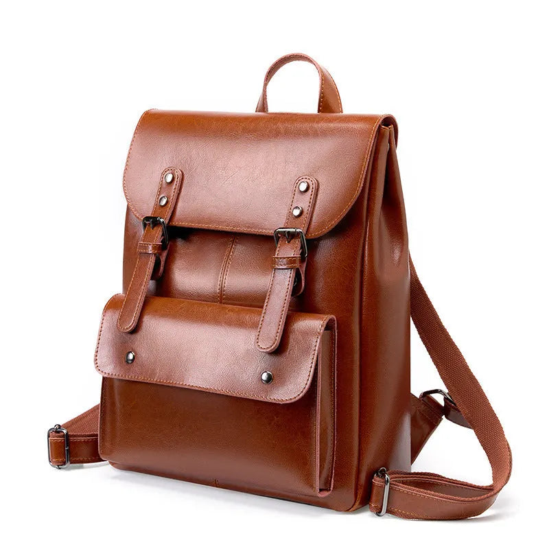 Genuine cowhide leather women's computer backpack in black, brown, or coffee colour.