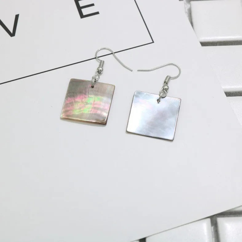 Natural shell geometric earrings in square panther and rectangular shell designs
