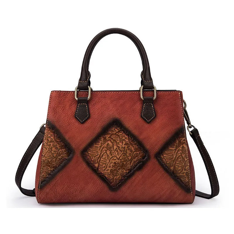 Retro brown top-layer cowhide women's handbag with zipper closure and soft handle, front view