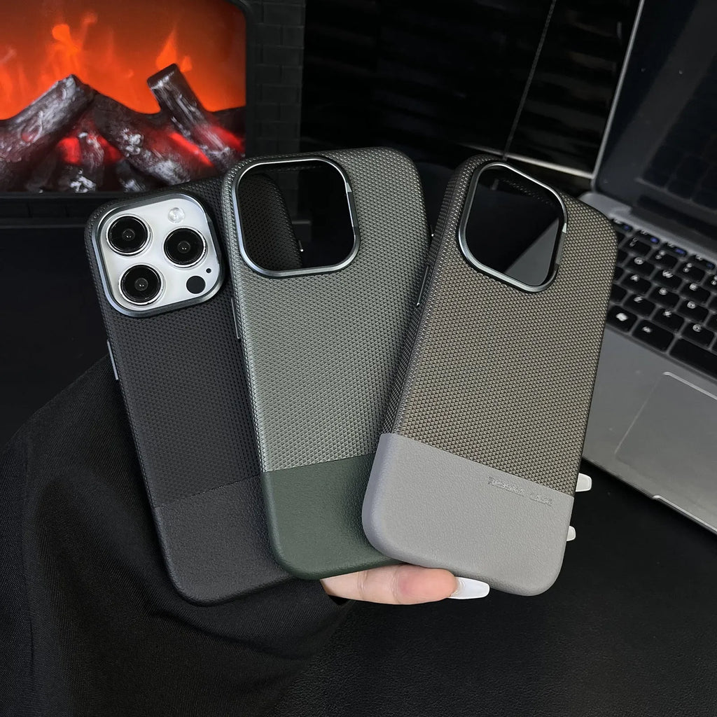 Black iPhone case with dragon scale texture and leather stitching, showing built-in magnetic ring on the back.