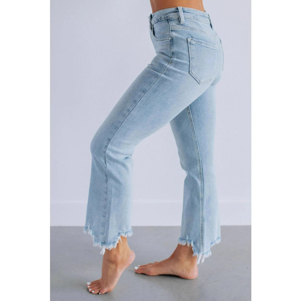 Women's solid colour denim trousers with hand-distressed detailing in dark blue