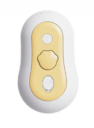 Beige coloured cordless pet grooming comb with massage teeth and spray function for cat hair removal.