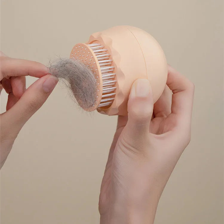 Floating massage pet needle comb with soft silicone brush head in orange pink and baby blue for cat hair cleaning