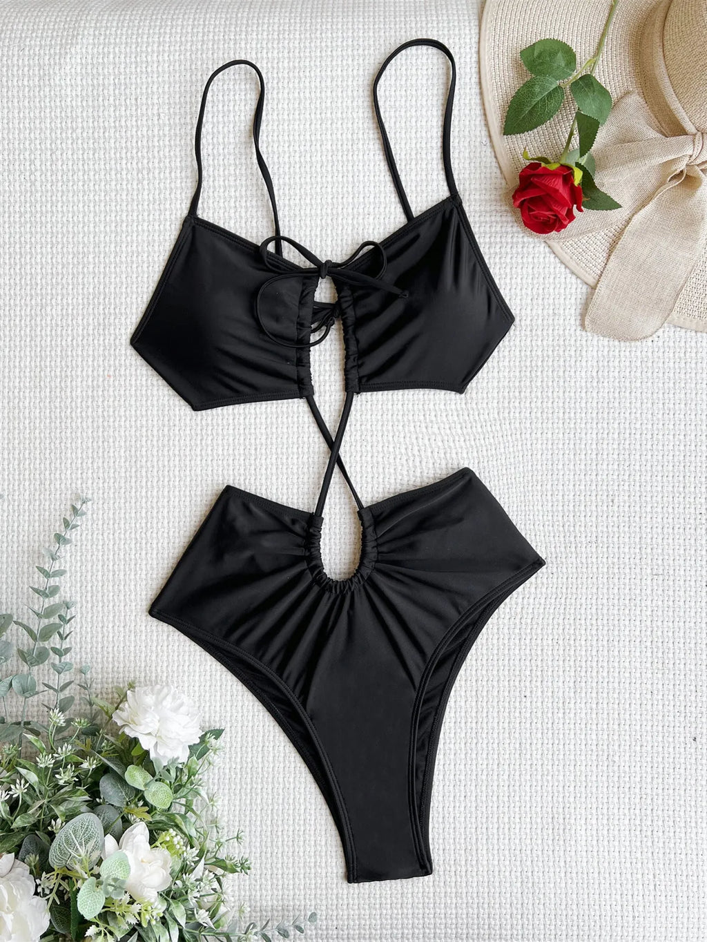 Women's sleeveless one-piece swimsuit with hollow back design in triangle style