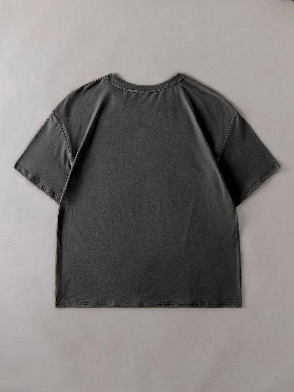 Loose straight cut cotton t-shirt in summer colours black green grey orange
