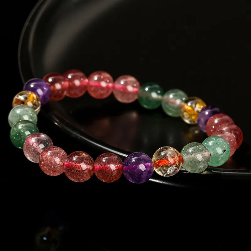 Natural tourmaline colour strawberry quartz bracelet with round geometric beads.