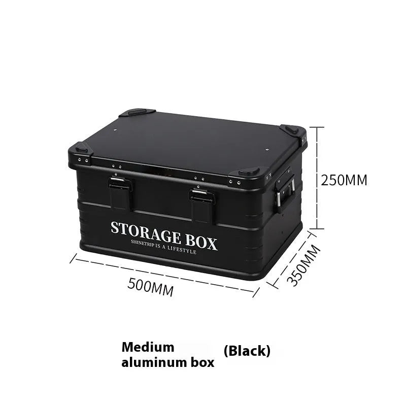 Army green waterproof storage box mounted in a vehicle cargo area.