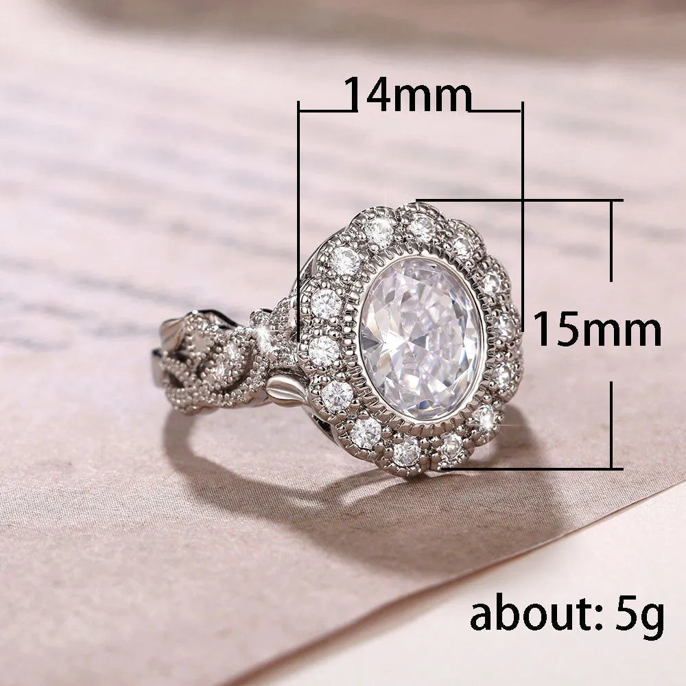 Round zircon ring with diamond copper plating in white gold colour on finger
