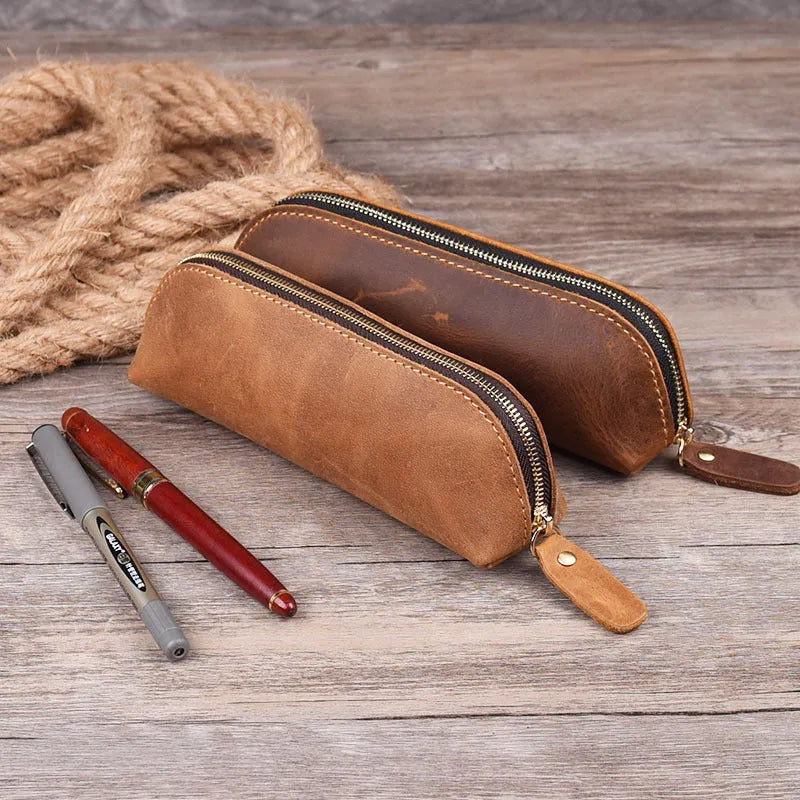 Square handmade cowhide leather pencil case with zipper in black, brown, dark brown, or yellow.