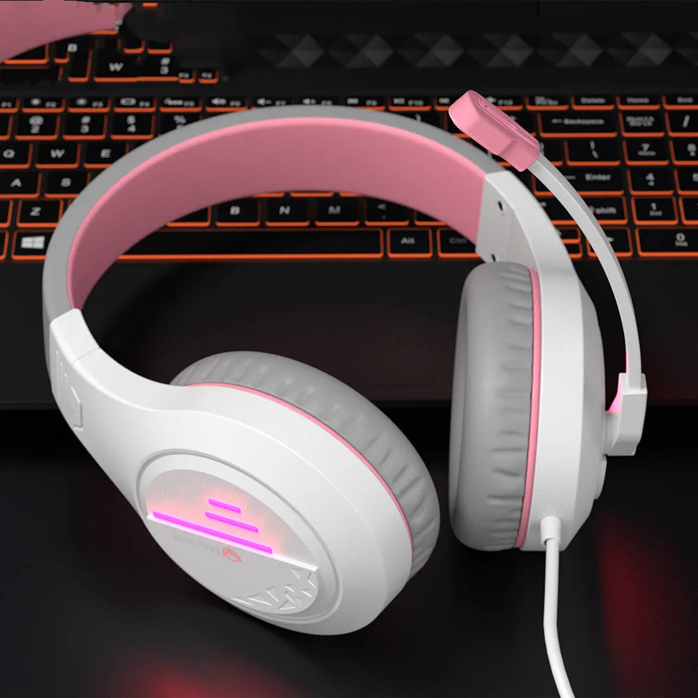 Wired gaming headset with black and orange colour scheme showing adjustable headband and 50mm ear cups