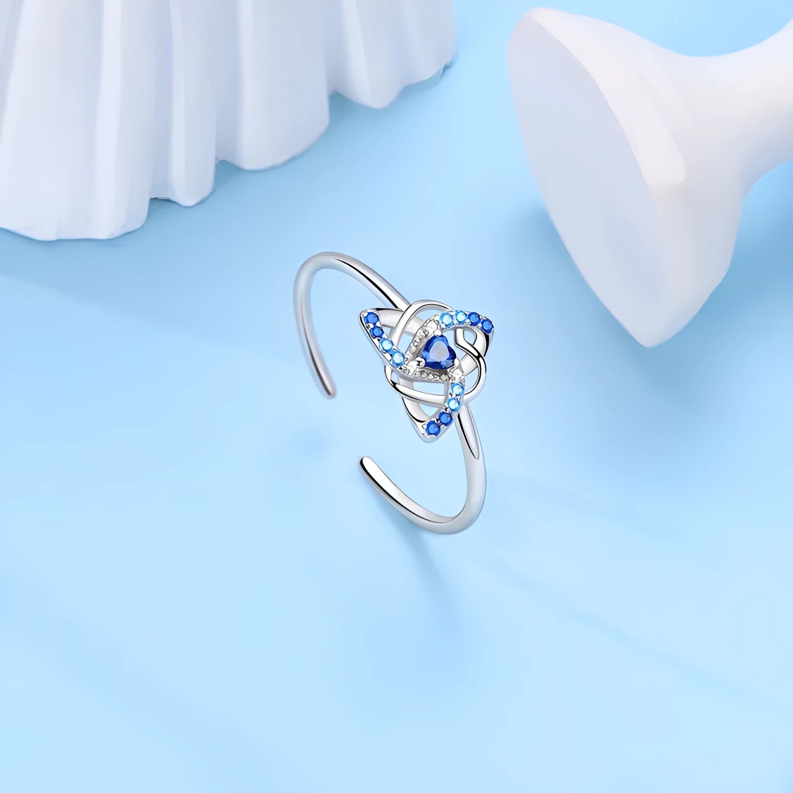 Sterling silver 925 heart-shaped dreamcatcher ring with adjustable opening in blue KSR080