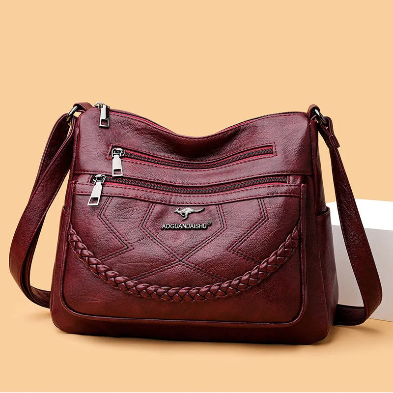 Soft black PU leather crossbody shoulder bag with a horizontal square shape and large capacity