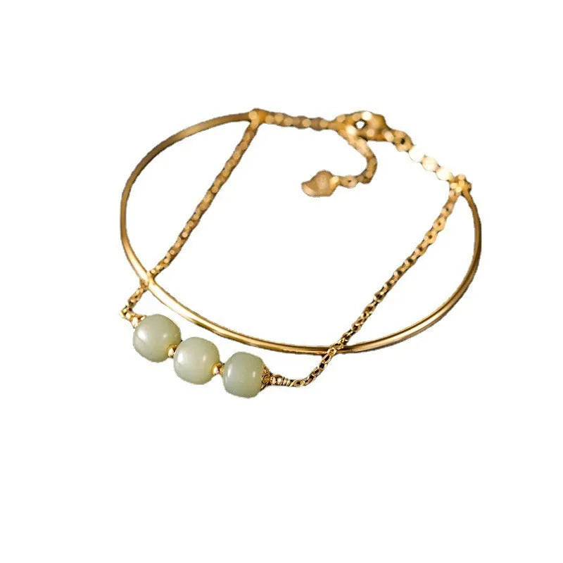 Women's Hetian jade lucky beads bracelet with gold inlay, shown in single, double, and three bead version styles.