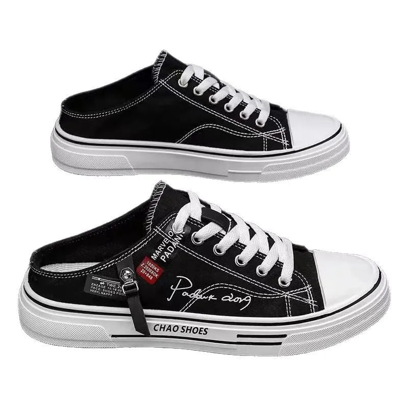 Men's black canvas slip-on casual shoes with round toe and PVC sole.