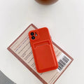 Orange TPU phone case with card slot back cover for iPhone showing protective edge