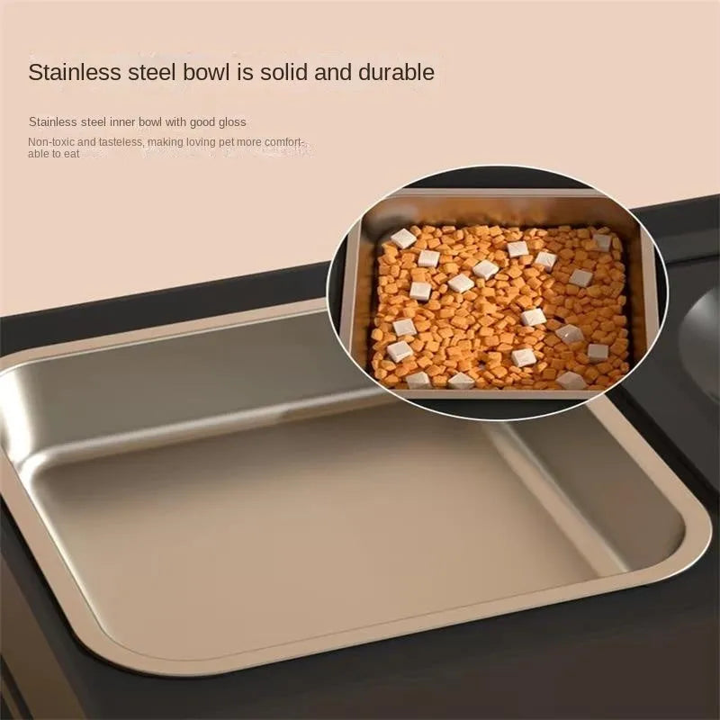 Adjustable height black and grey plastic dog feeder stand with two stainless steel bowls at medium setting