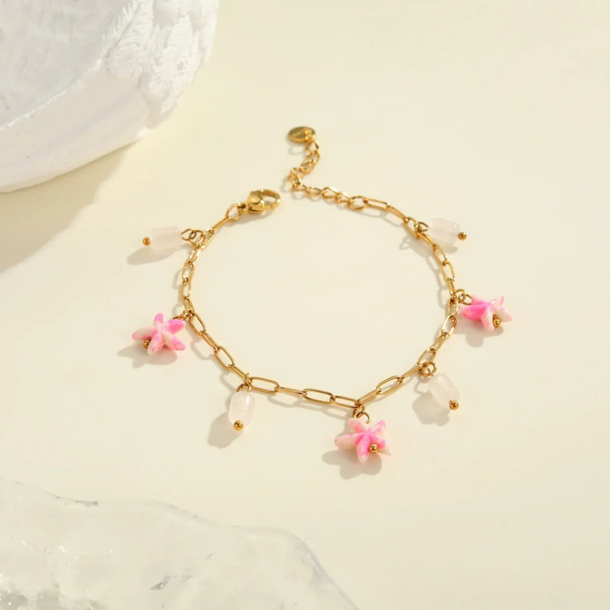 Stainless steel starfish necklace and bracelet set with electroplated 18K finish in blue, green, or pink