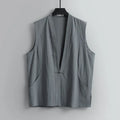 Men's solid colour linen sleeveless vest in a loose fit for summer.
