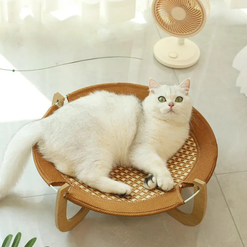 Brown woven rattan pet hammock measuring 46cm square with open weave design
