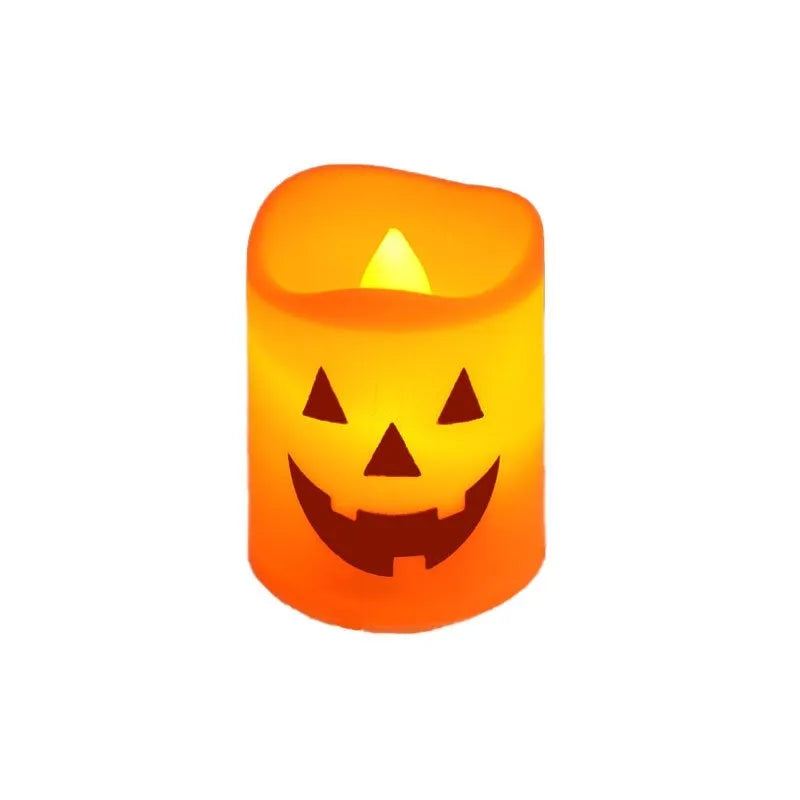 Set of six pumpkin-coloured plastic electric candle lamps arranged for Halloween decoration