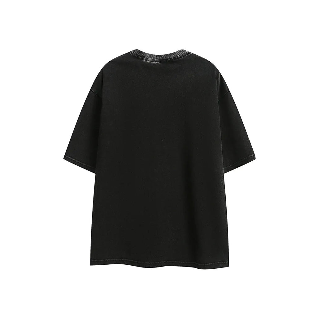 Purple and black washed cotton retro T-shirt with embroidery, shown in loose fit with half-length sleeves.