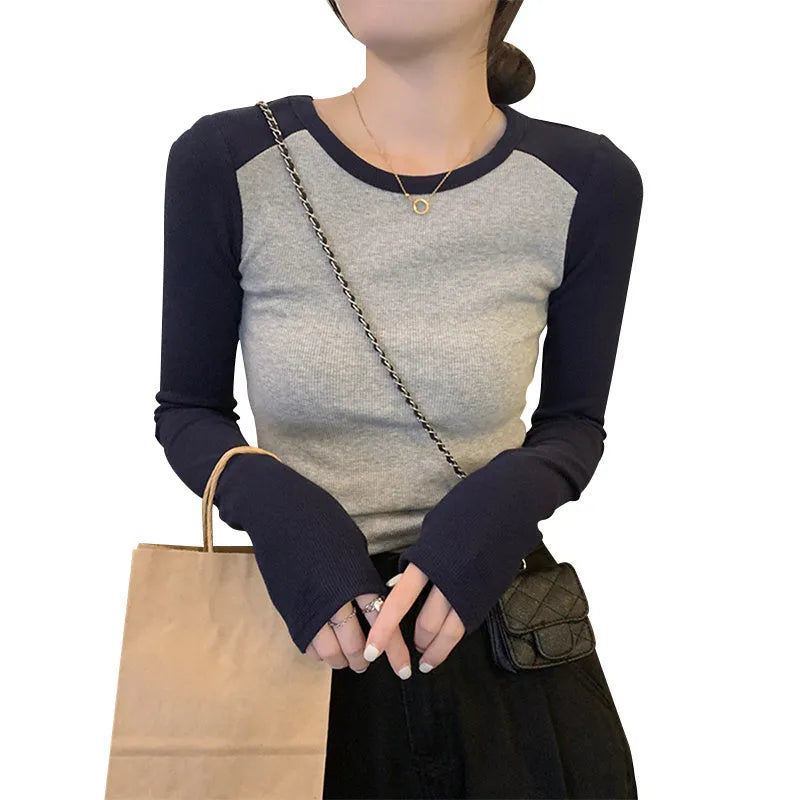 Women's oversized dark blue viscose top with embroidery on the front and long princess sleeves.