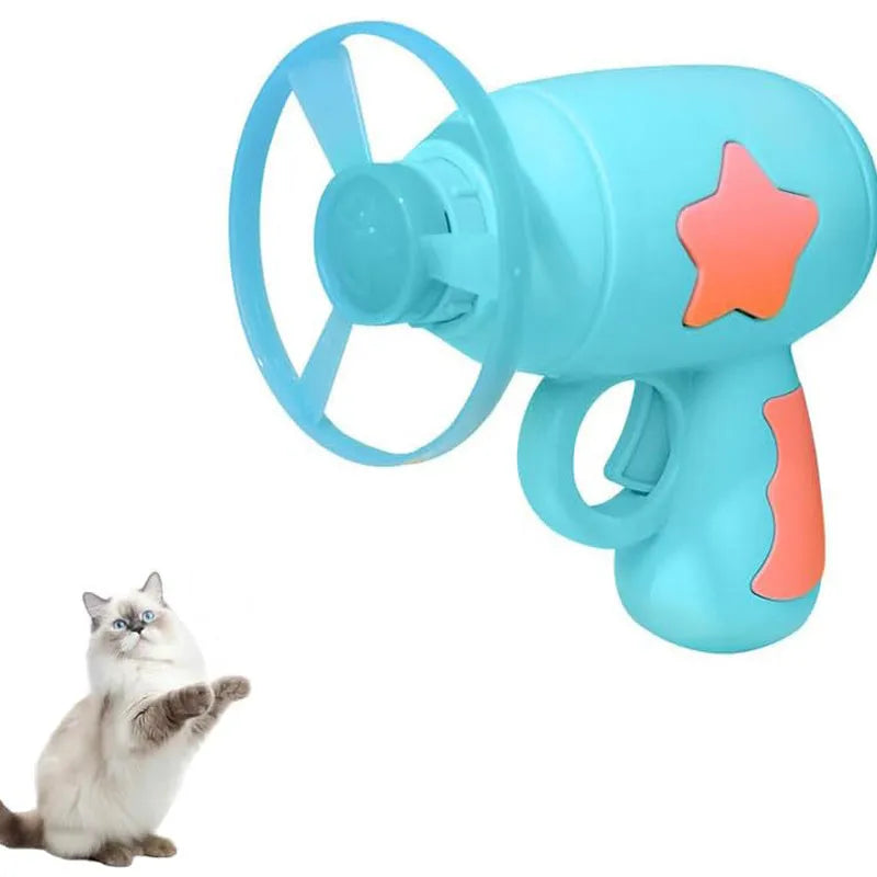 Blue plastic cat toy gun with spinning Frisbee ready for launch