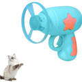 Blue plastic cat toy gun with spinning Frisbee ready for launch