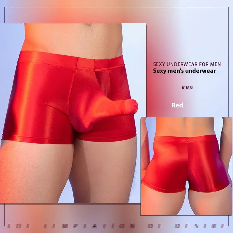 Men's thin nylon boxer shorts in red, showing seamless construction and mid-waist style.