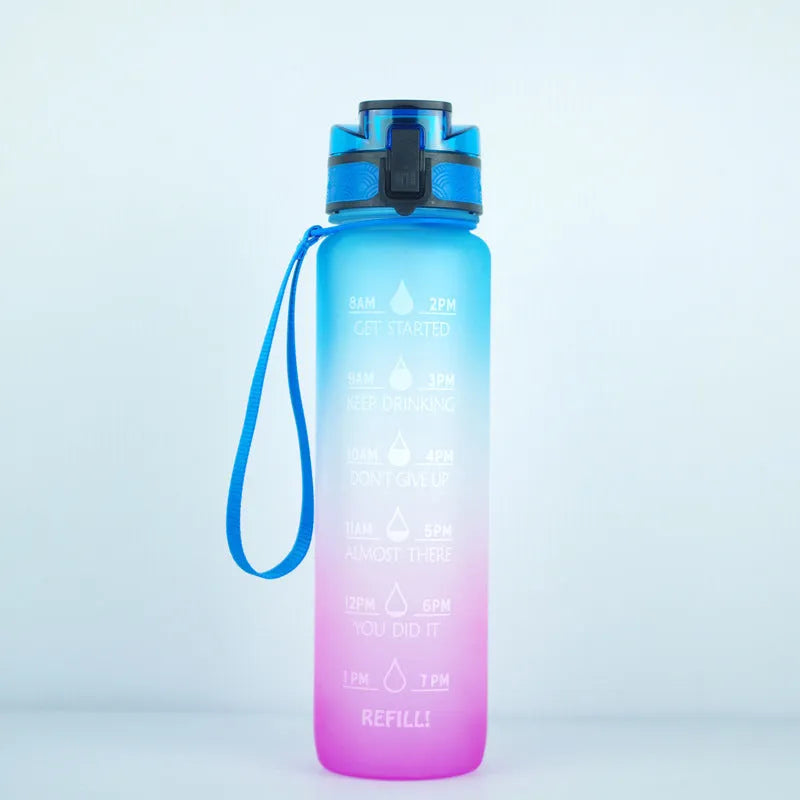 Clear transparent 1000ml sports water bottle with blue lid and removable fruit infuser inside.
