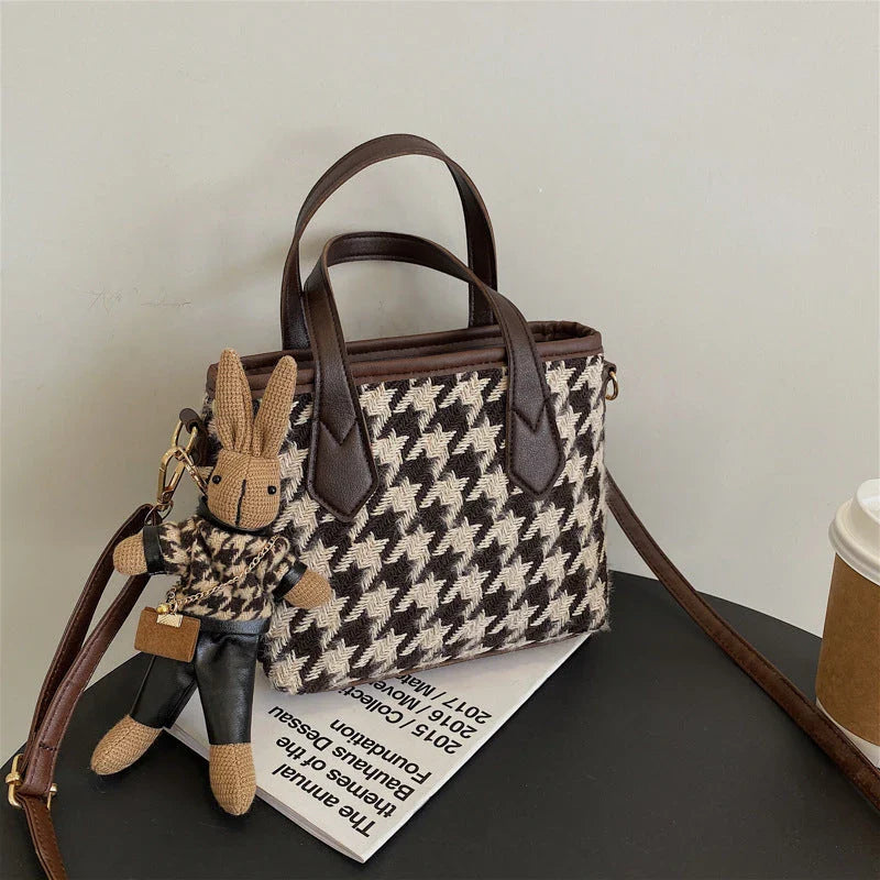 Stylish houndstooth shoulder bags in various colors, featuring a spacious square shape, adjustable strap, and classic checkerboard pattern.