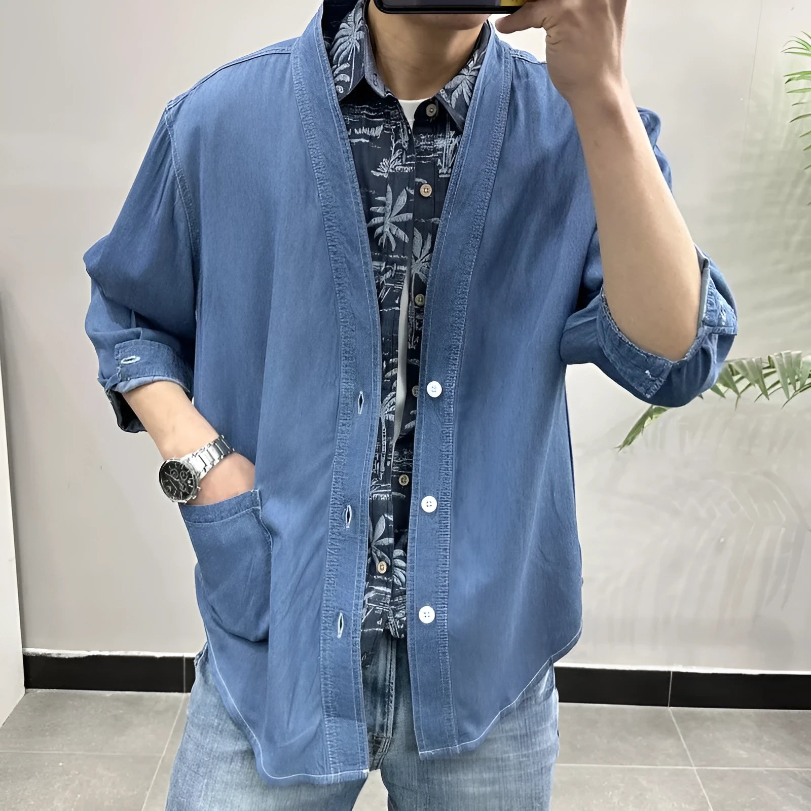 Men's dark blue denim coat with three-quarter sleeves and V-neck collar