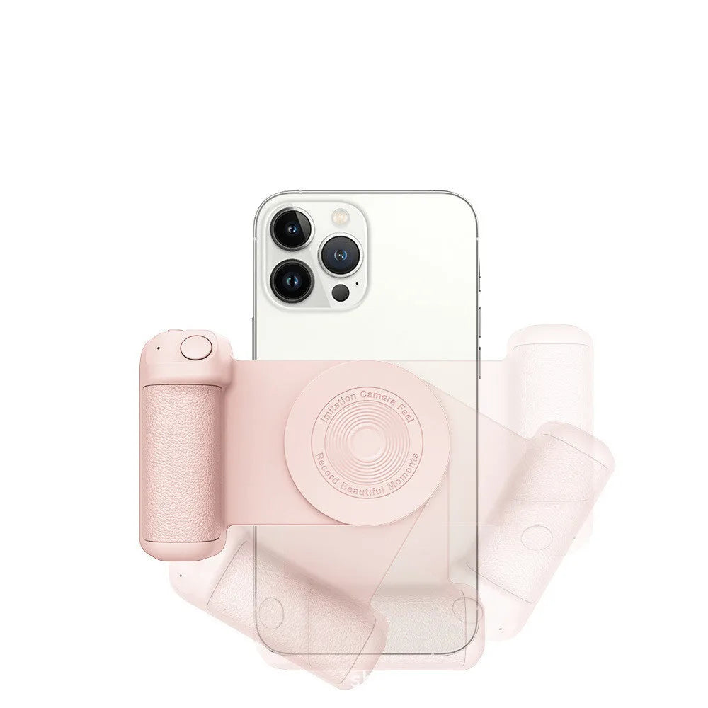 Black magnetic phone camera holder with rotatable grip on wooden table demonstrating phone attachment