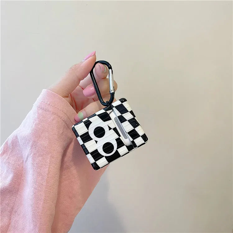 Checkerboard black and white grid TPU protective cover with large cartoon eyes for AirPods 1 2 3