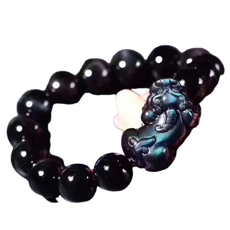 Natural ice colour eye obsidian crystal bracelet with polished round beads on wrist