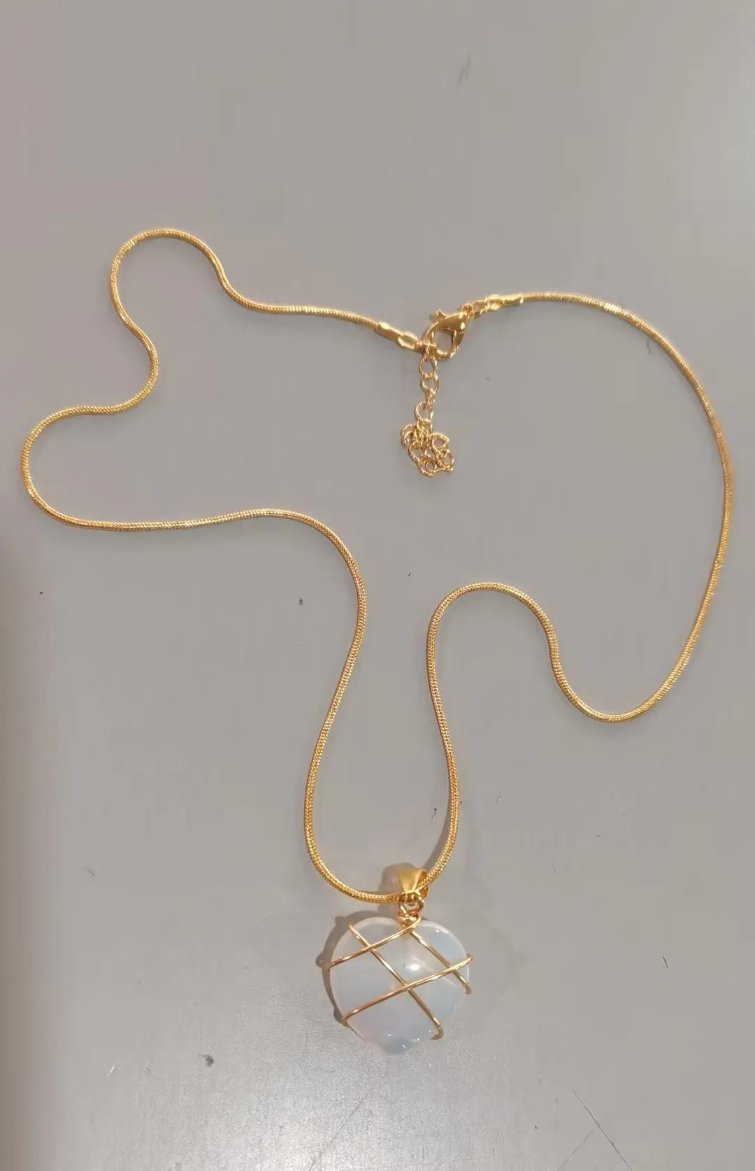 Heart-shaped moonstone pendant necklace on copper chain with electroplated real gold finish