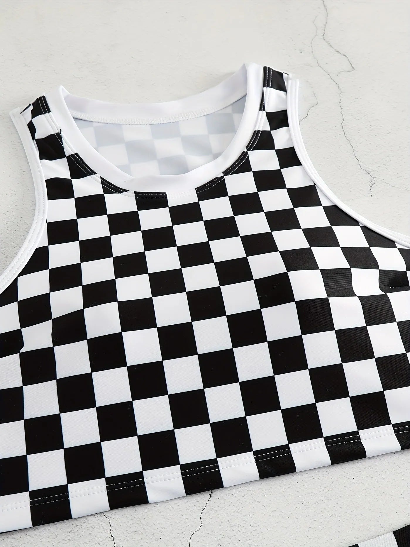 Checkered racing one-piece swimsuit with backless design and suspender straps