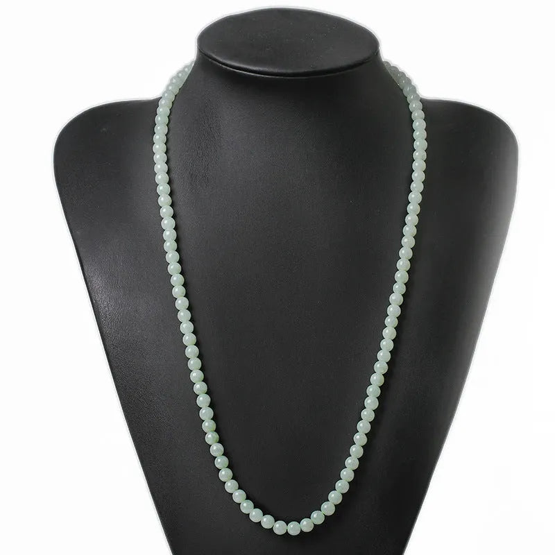 Adjustable jade bead necklace with 6.5mm round beads showing white and green colour variations