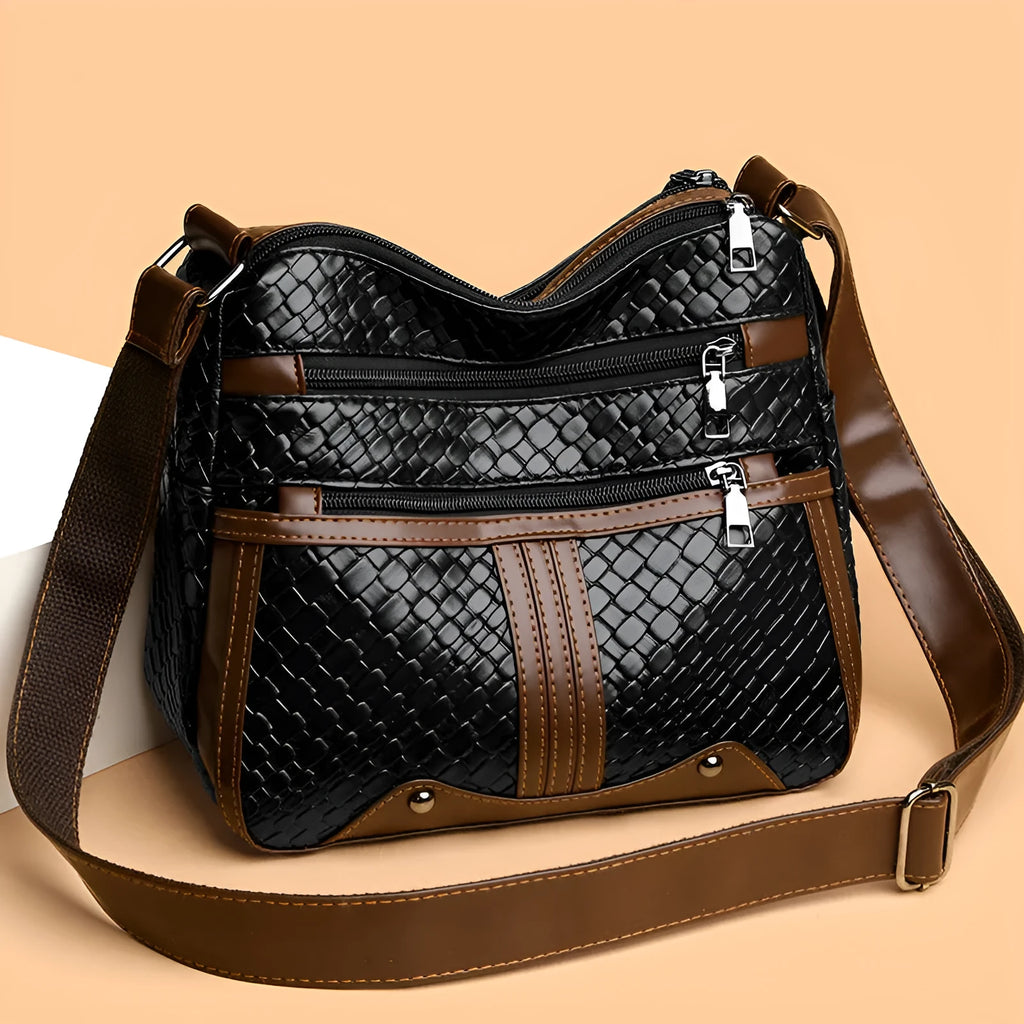 Woven PU leather messenger bag with multiple compartments and single shoulder strap