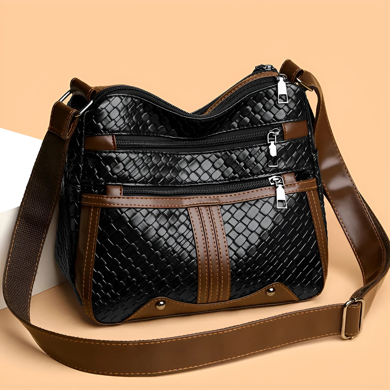 Woven PU leather messenger bag with multiple compartments and single shoulder strap