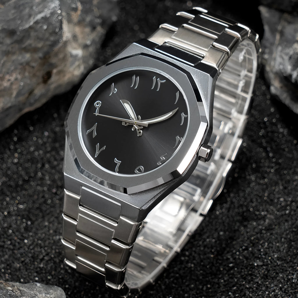 Men's business casual watch with stainless steel band and black dial on wrist
