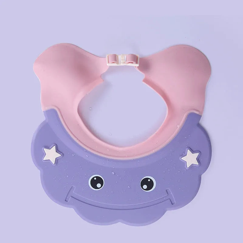 Adjustable plastic baby shower cap protector in blue, orange blue, and purple pink colours for hair washing