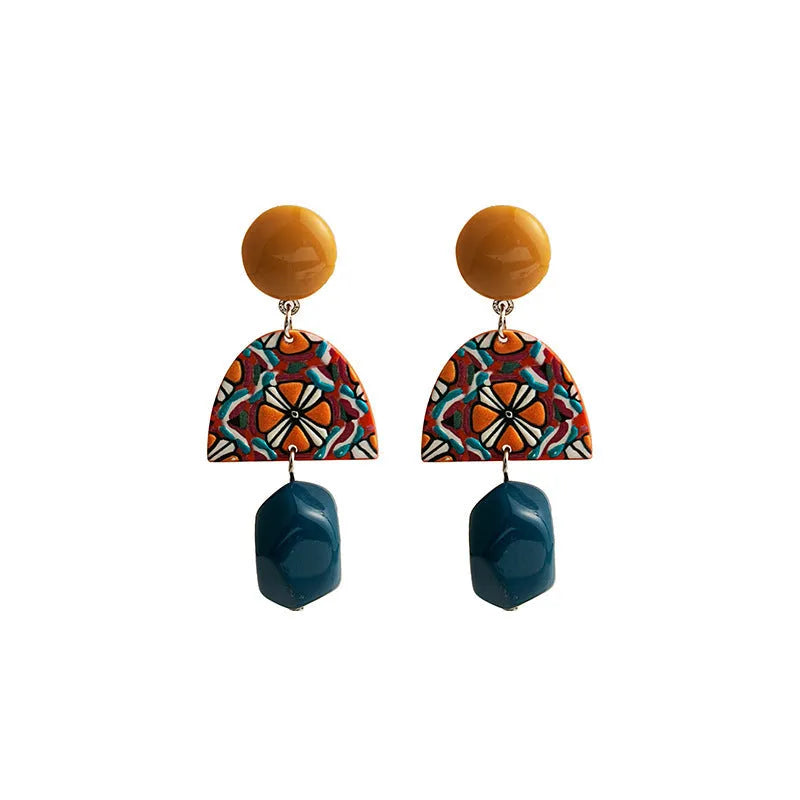 Retro yellow and blue acrylic earrings with irregular geometric shape and electroplated finish, one pair
