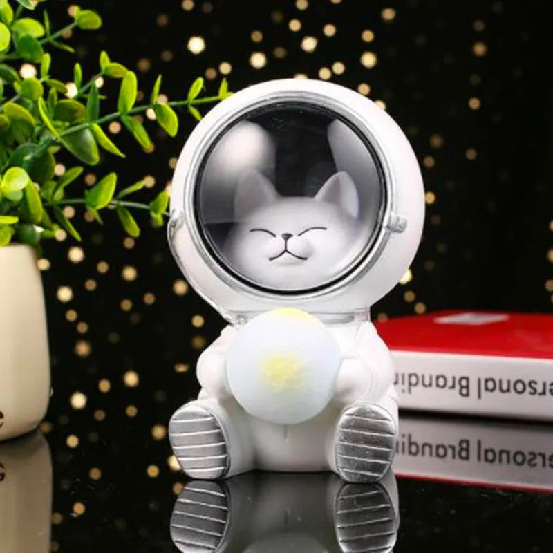 Animal-themed resin night light projecting starry sky lighting effect on surface