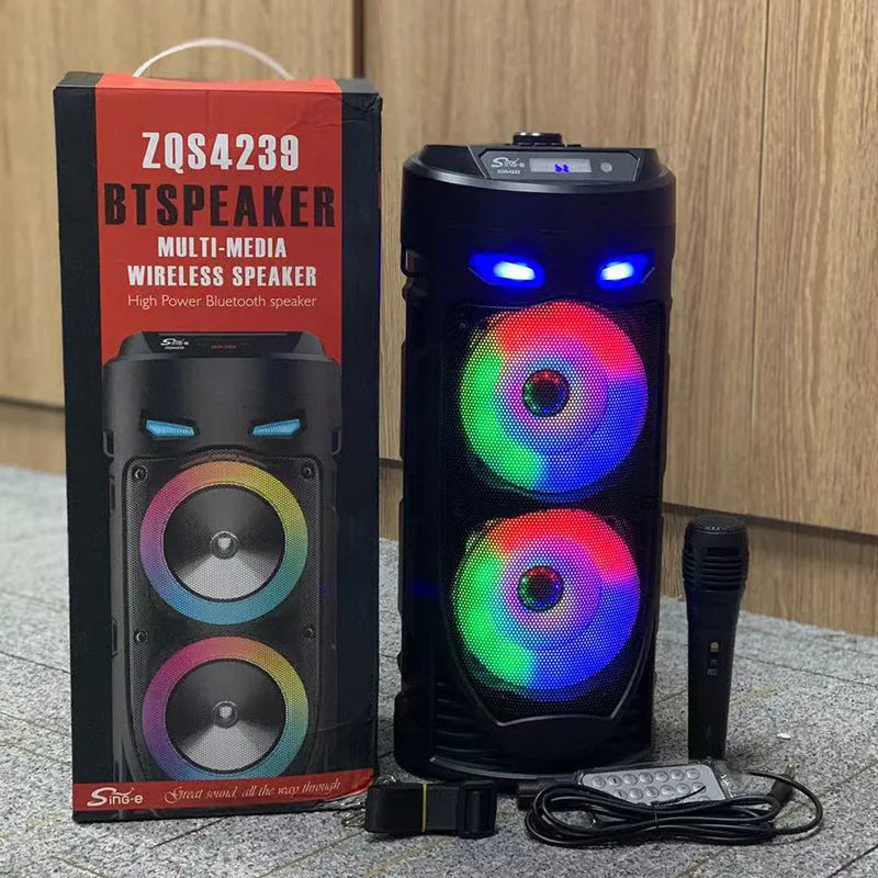 Black portable Bluetooth speaker with dual horn cannon design showing front panel with controls