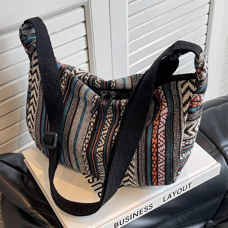 Women's ethnic style canvas dumpling crossbody bag in five colours.