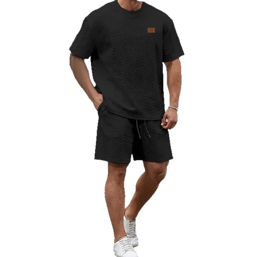 Men's black solid colour short sleeve ribbed T-shirt and matching shorts sportswear set with patch design